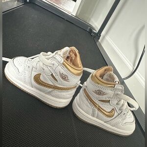 Jordan 1s Kids White and Gold Sneakers